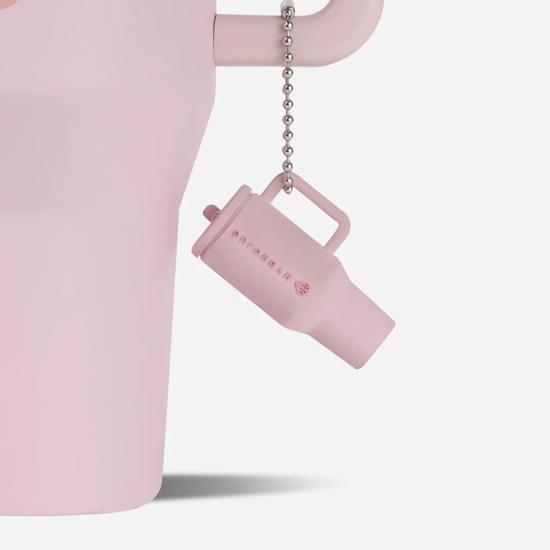 traveler-keychain-h4 Web-TravelerKeychainPhotos-PinkSand2.webp